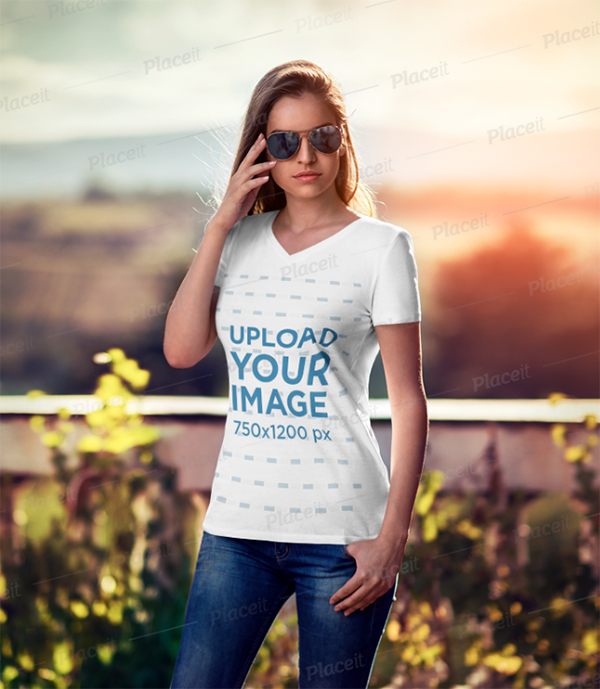 T-Shirt Mockup of A Woman Wearing Sungalasses