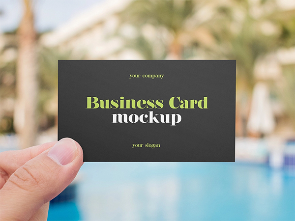 Free Hand Holding Business Card Mockup